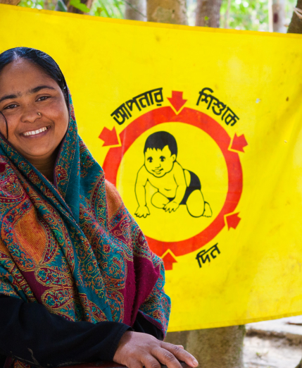 Woman at Child Vaccination Center in Bangladesh