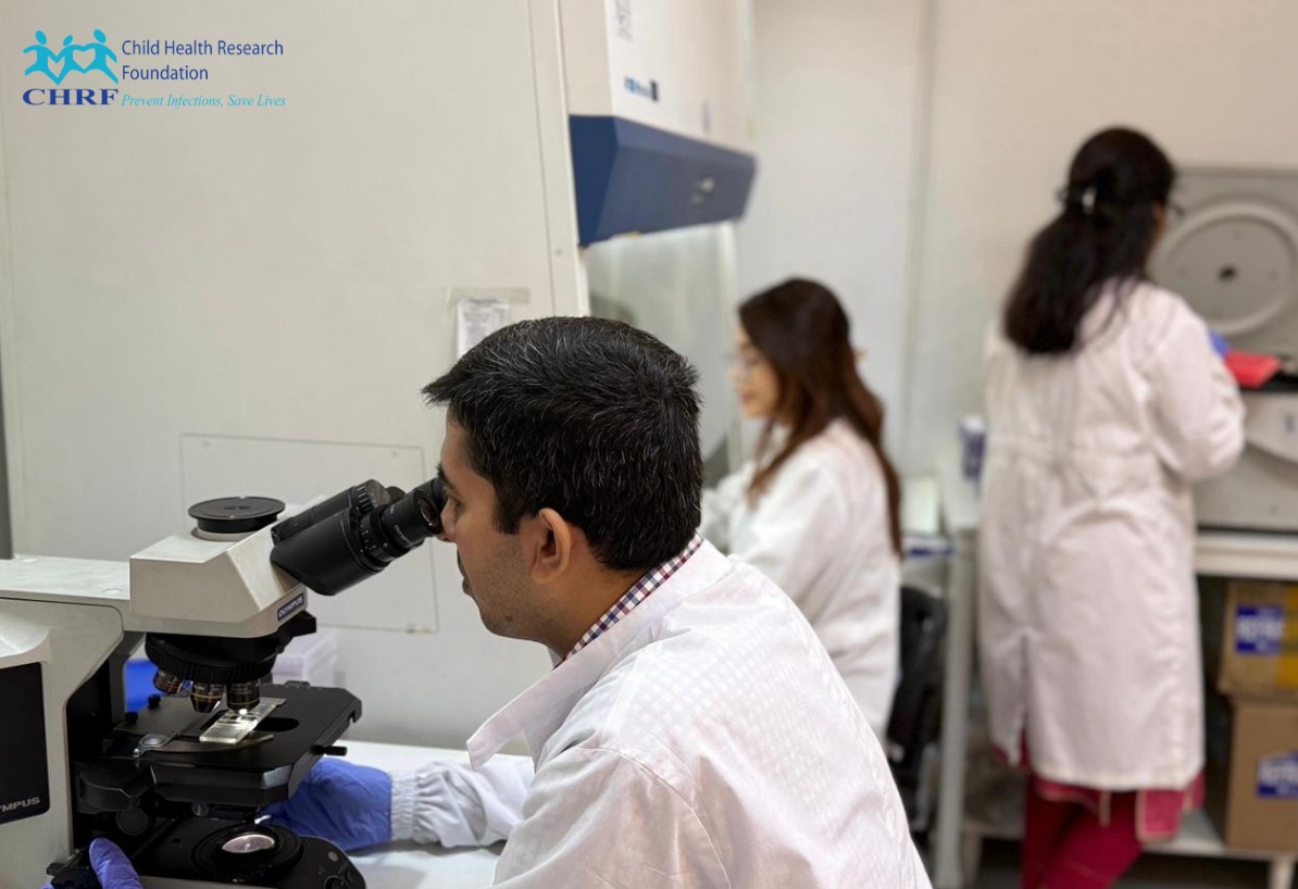 Sometimes, researchers quietly discuss results or procedures; other times, lively discussions fi